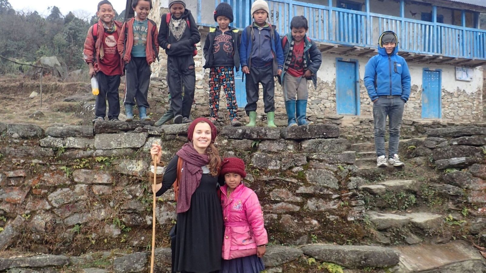 A trekker visiting a local school